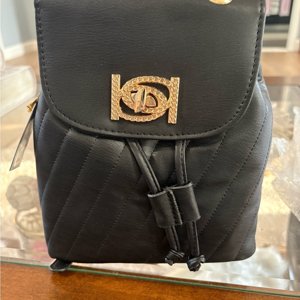 bebe Black Quilted Backpack with Gold Accents
